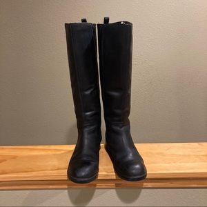 Clark’s tall black boots
